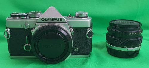 Περισσότερες πληροφορίες για "OLYMPUS OM1 SLR+ ZUIKO 50mm 1,8"