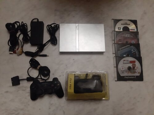 Περισσότερες πληροφορίες για "Sony PlayStation 2 slim ασημένια κονσόλα με 4 παιχνίδια και 2 χειριστήρια μεταχειρισμένη"